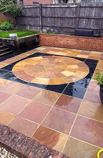 Patio before and after pressure washing after exterior work